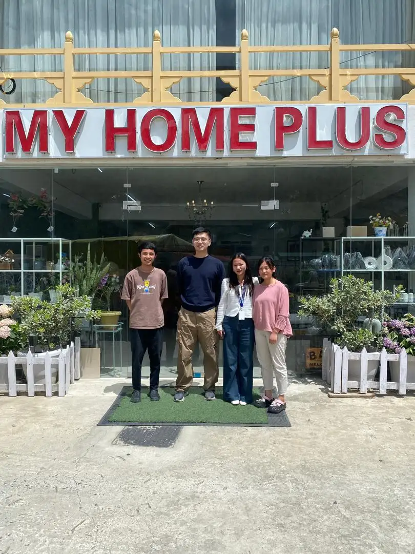 My Home Plus team with the aBit consultants outside the My Home Plus storefront in Thimphu