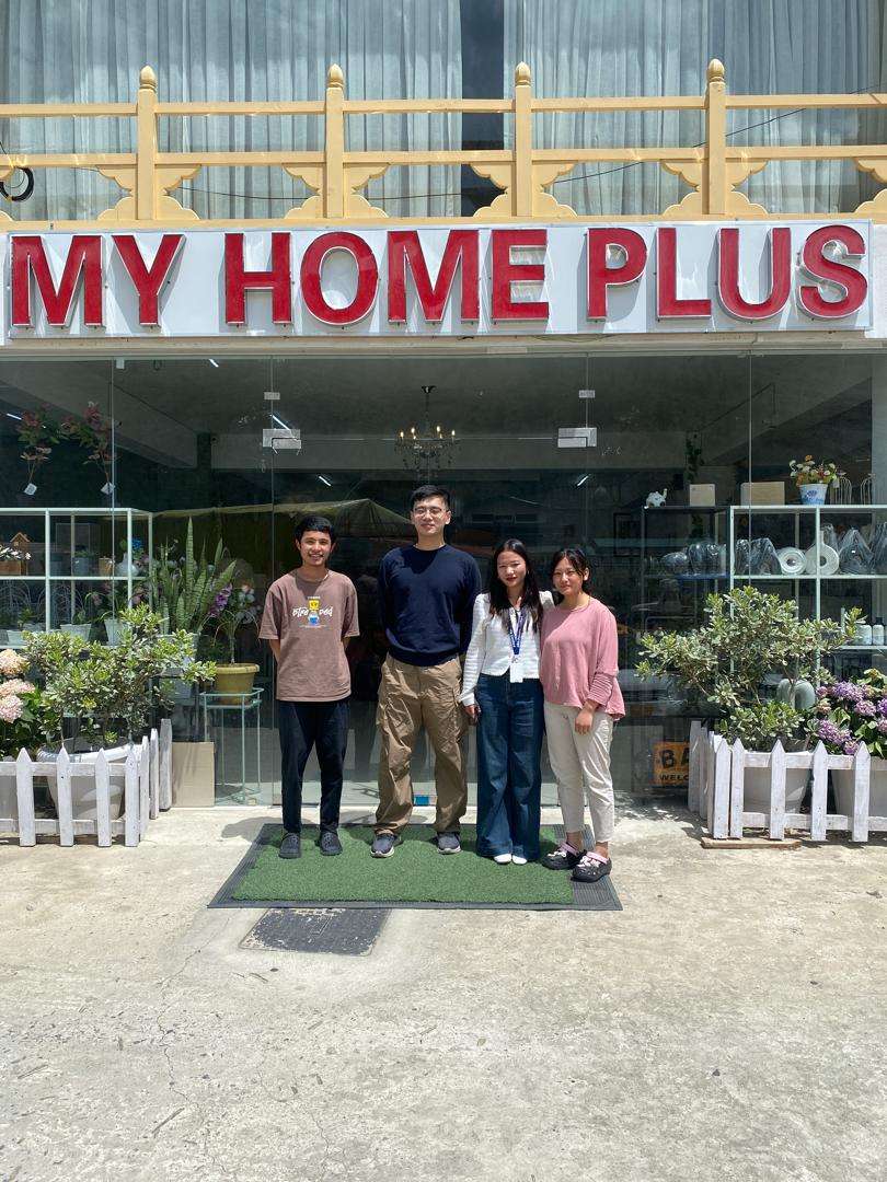 My Home Plus team with the aBit consultants outside the storefront in Thimphu