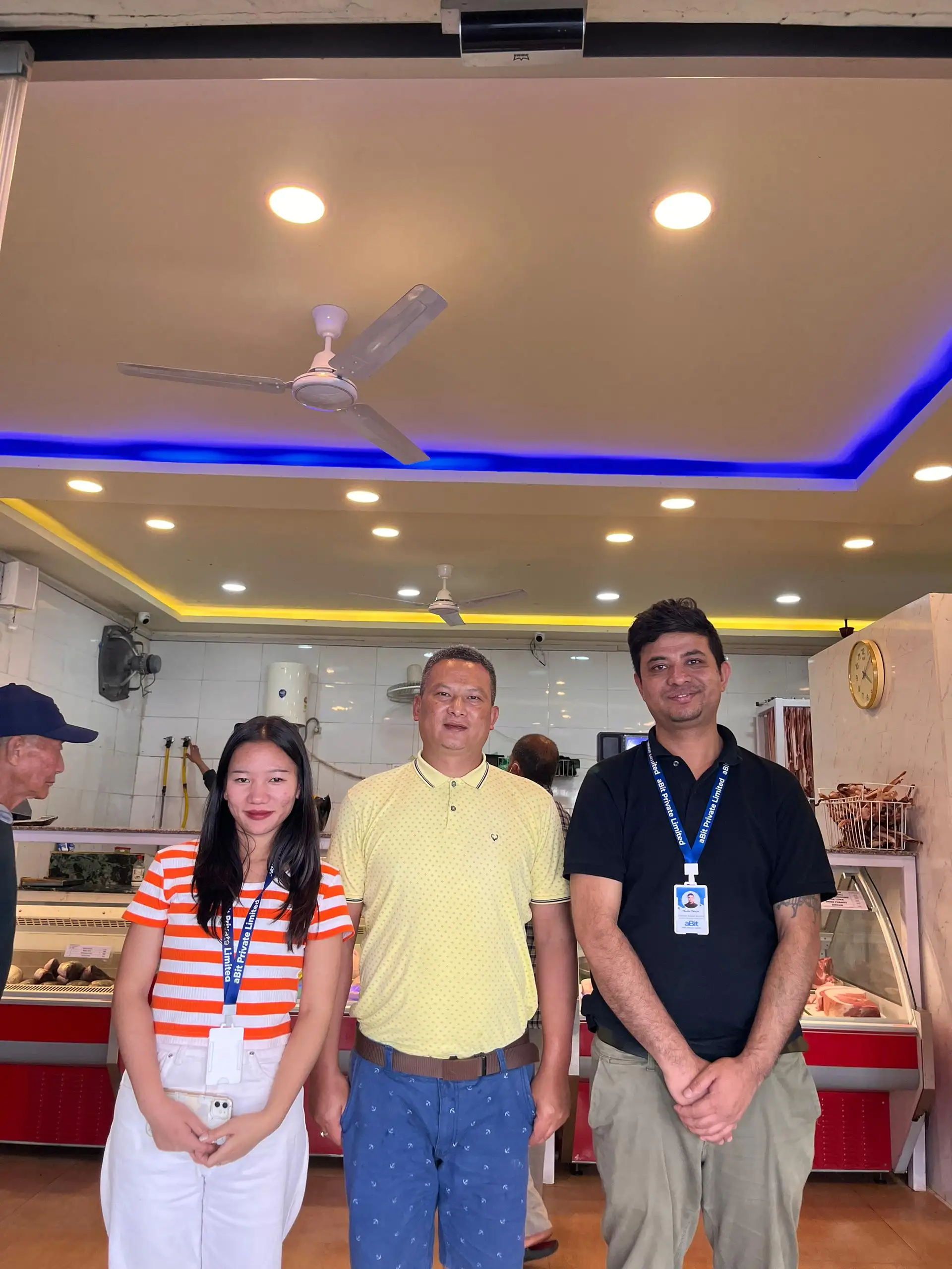 PR Meat Shop owner with the aBit team inside the shop after going live on aBitPOS in Thimphu