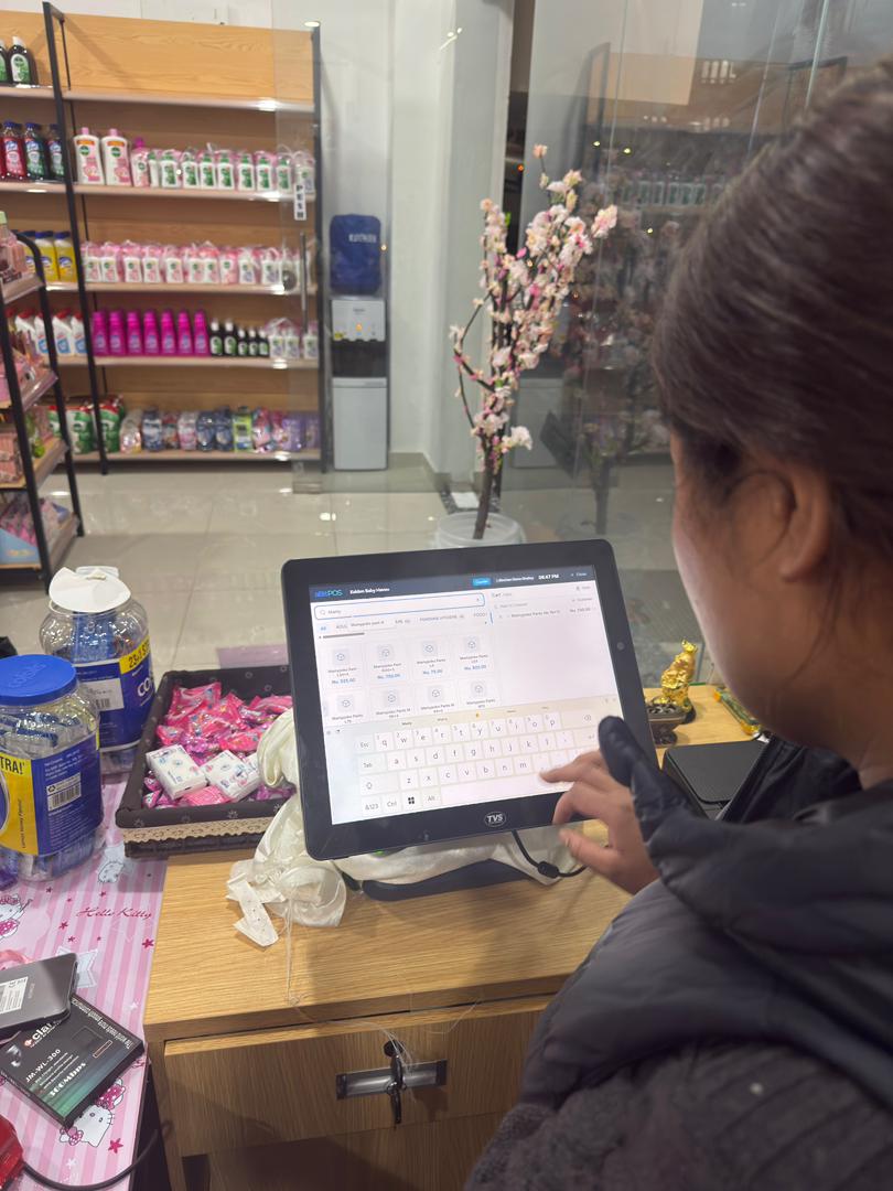 Kelden Baby Haven staff using aBitPOS touchscreen terminal
