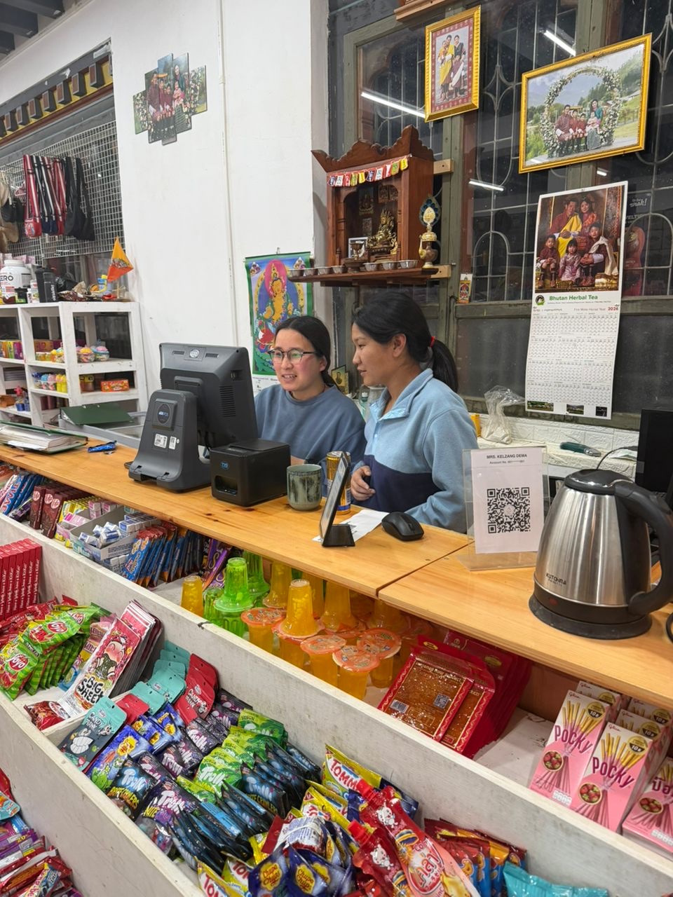 UD Departmental Store staff at the counter running aBitPOS